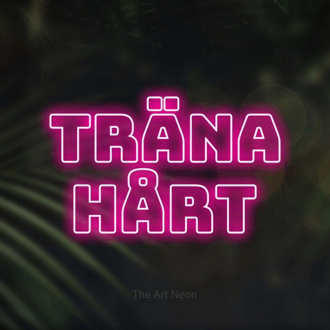 LED neon sign reading “Träna Hårt”, arranged in 2 lines.