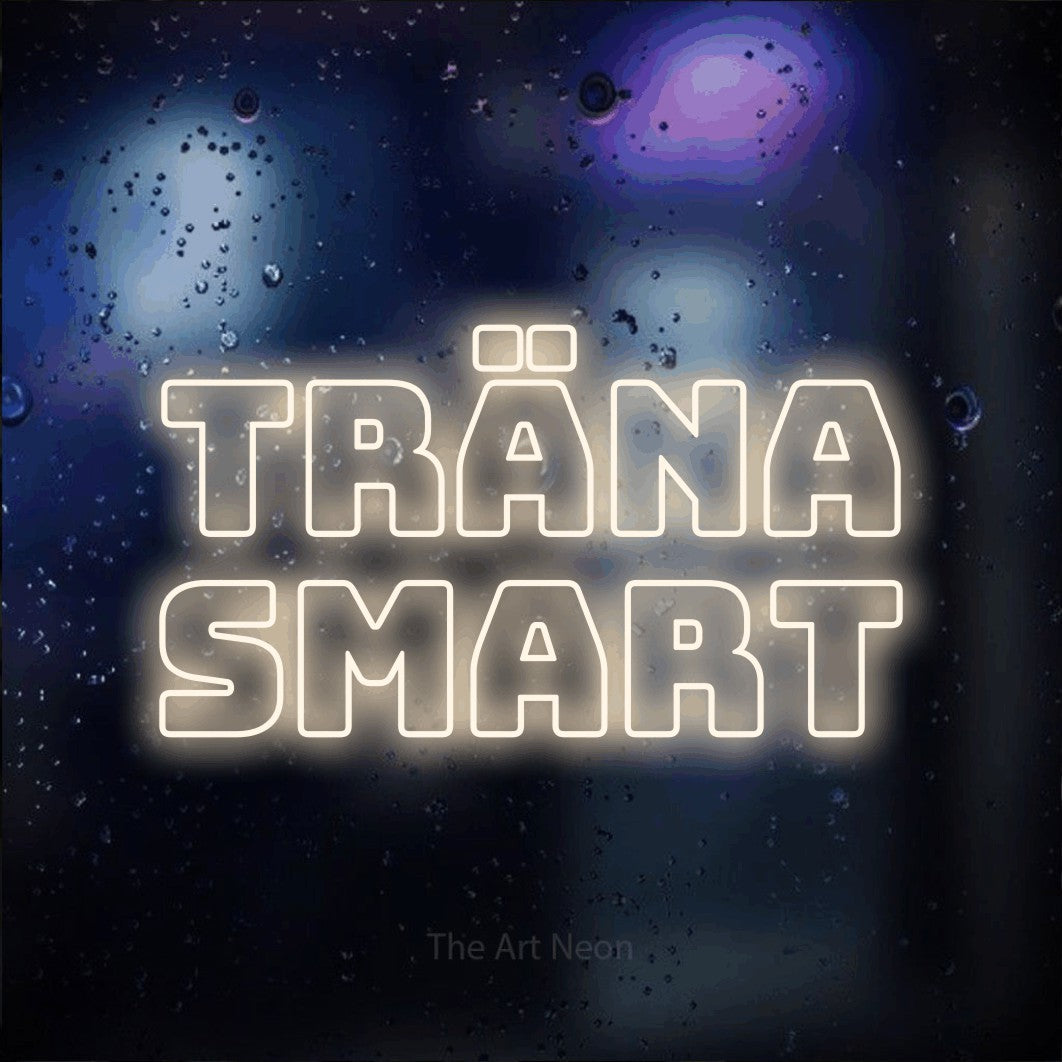 LED neon sign reading “Träna Smart”, arranged in 2 lines.