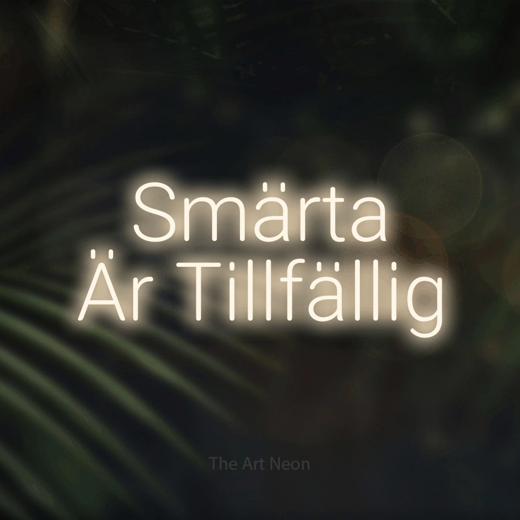 LED neon sign reading “Smärta Är Tillfällig”, arranged in 2 lines.