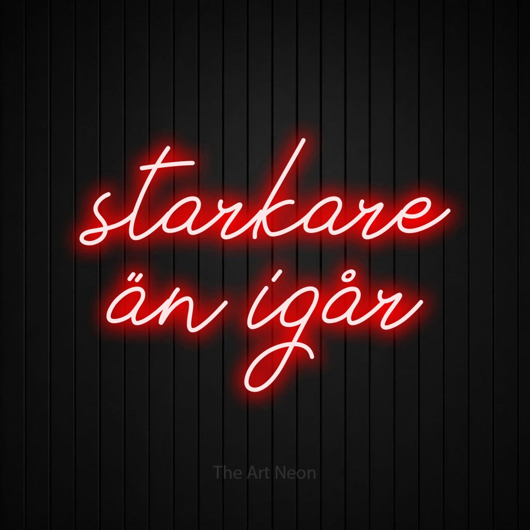 LED neon sign reading “starkare än igår”, arranged in 2 lines.