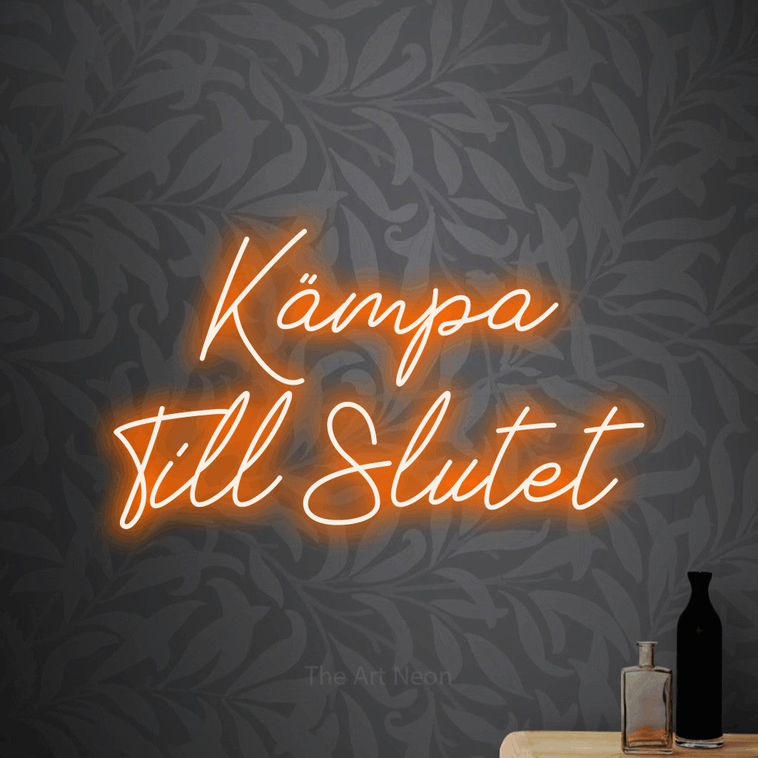LED neon sign reading “Kämpa Till Slutet”, arranged in 2 lines.