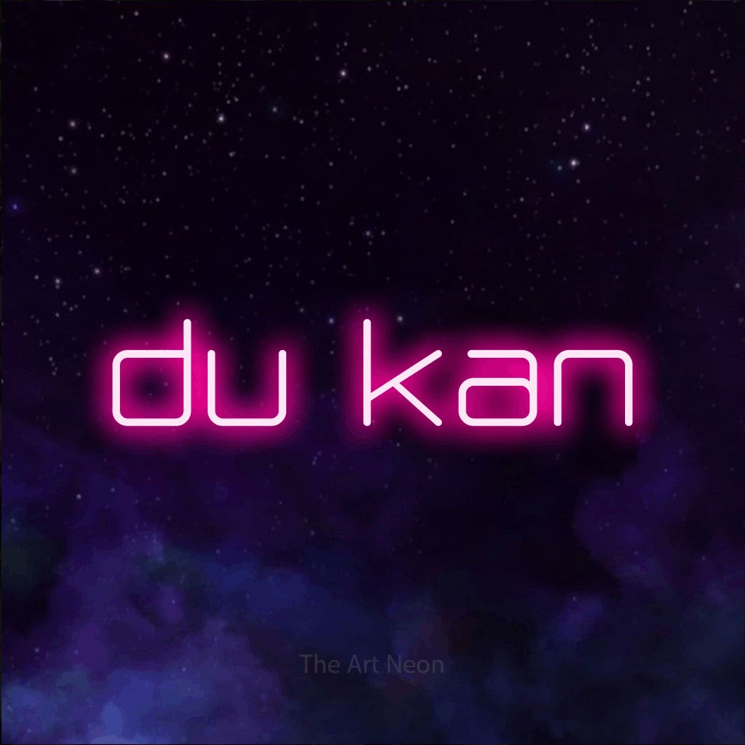 LED neon sign reading “du kan”, arranged in a single line.