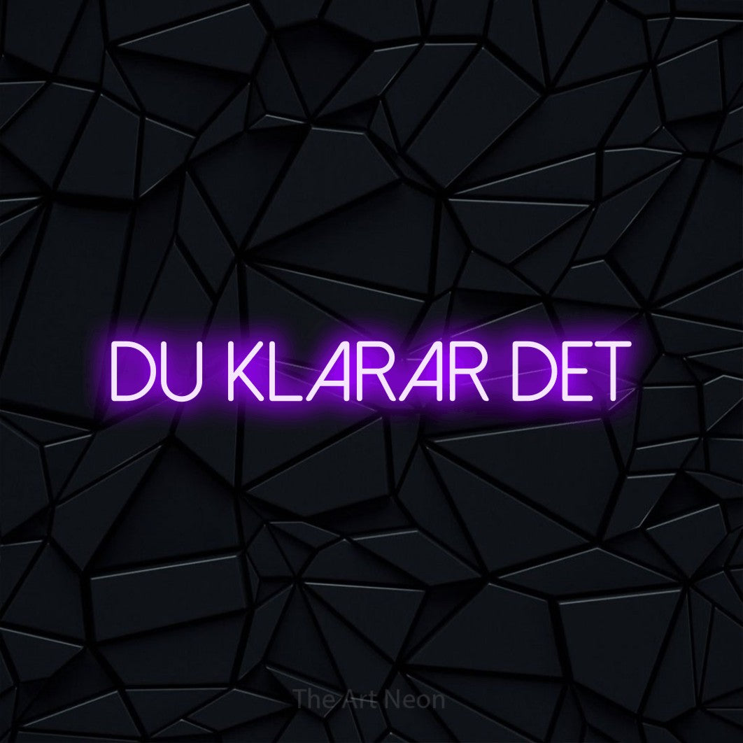 LED neon sign reading “du KLARAR det”, arranged in a single line.