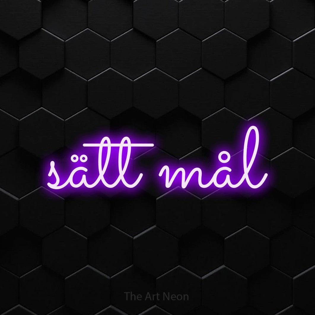 LED neon sign reading “sätt mål”, arranged in a single line.