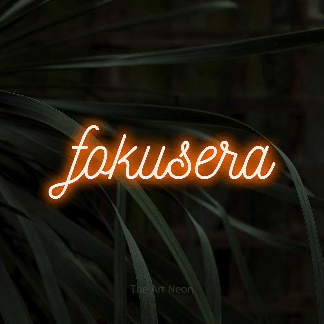 LED neon sign reading “fokusera”, arranged in a single line.
