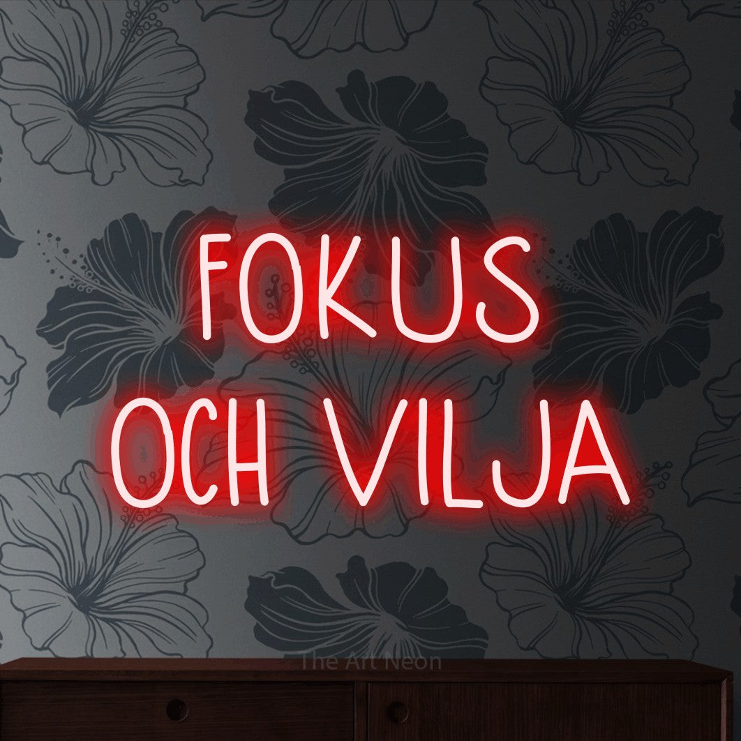 LED neon sign reading “FOKUS OCH VILJA”, arranged in 2 lines.