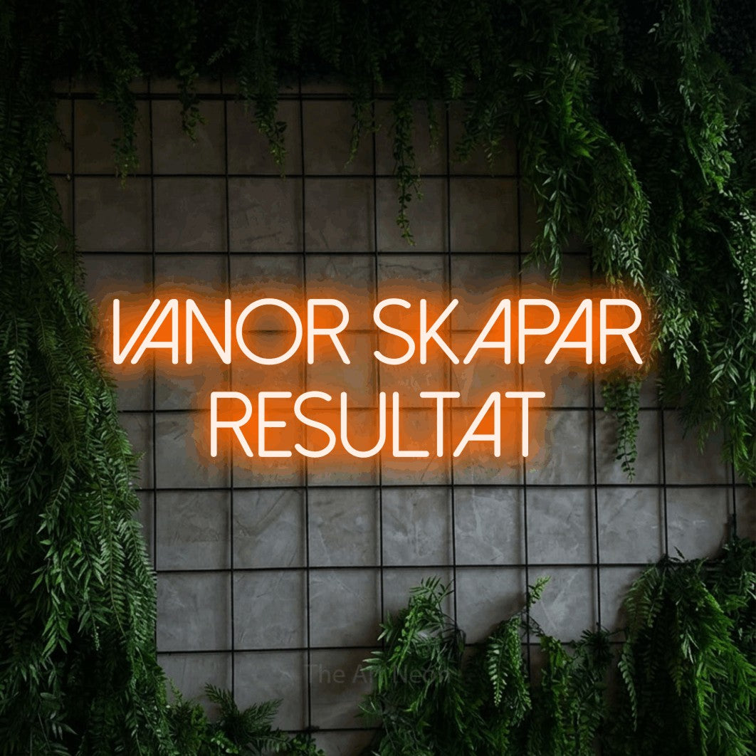 LED neon sign reading “VANOR SKAPAR RESULTAT”, arranged in 2 lines.