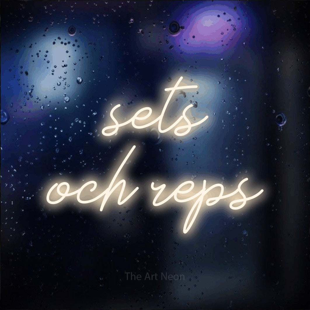 LED neon sign reading “sets och reps”, arranged in 2 lines.
