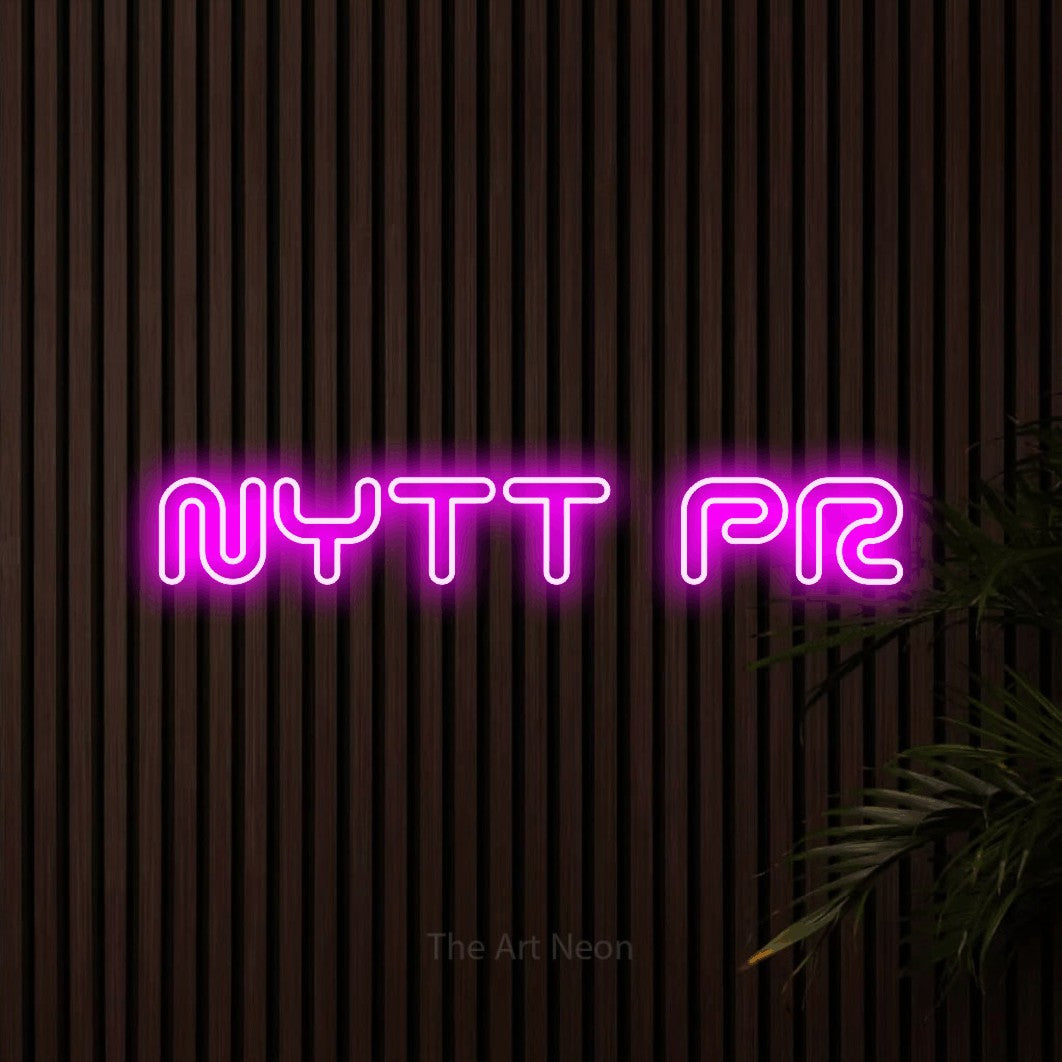LED neon sign reading “NYTT PR”, arranged in a single line.