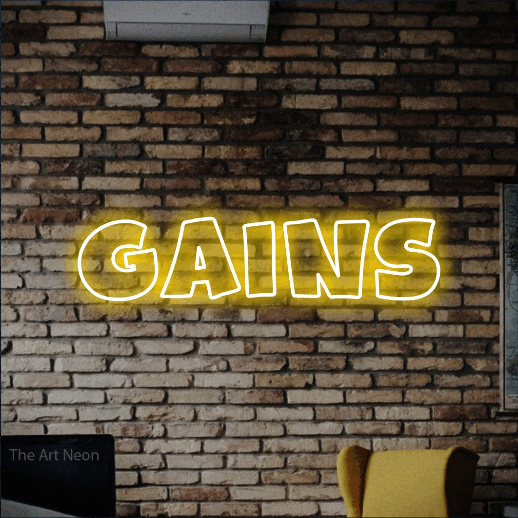 LED neon sign reading “GAINS”, arranged in a single line.