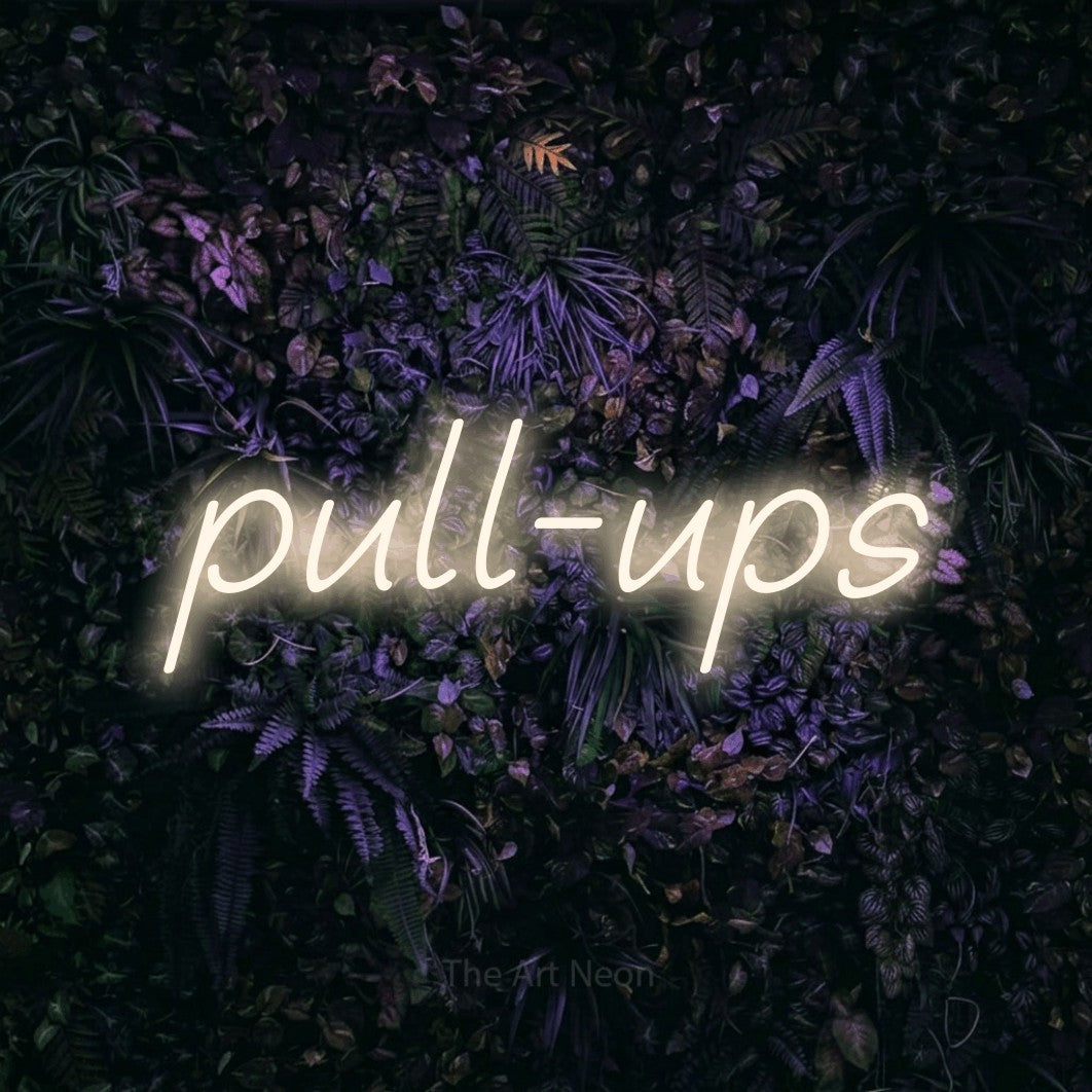 LED neon sign reading “pull-ups”, arranged in a single line.