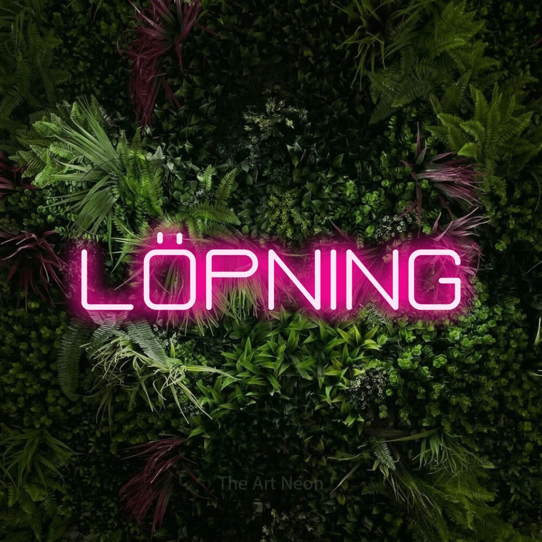 LED neon sign reading “LÖPNING”, arranged in a single line.