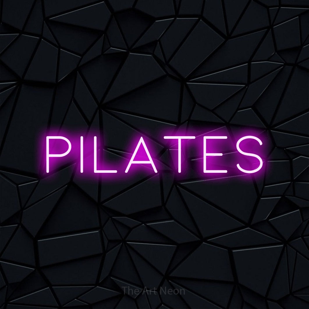 LED neon sign reading “Pilates”, arranged in a single line.