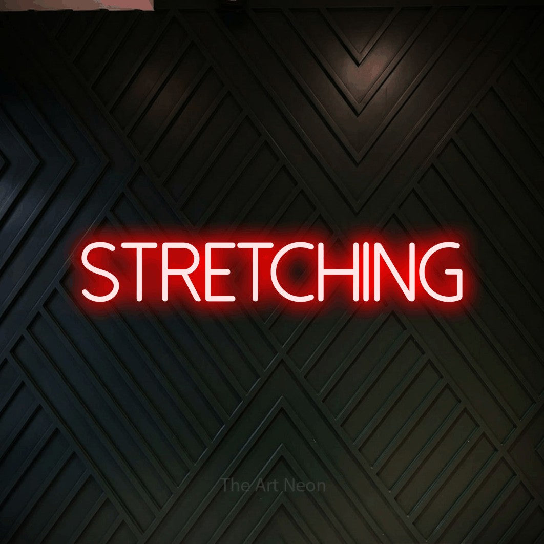 LED neon sign reading “stretching”, arranged in a single line.