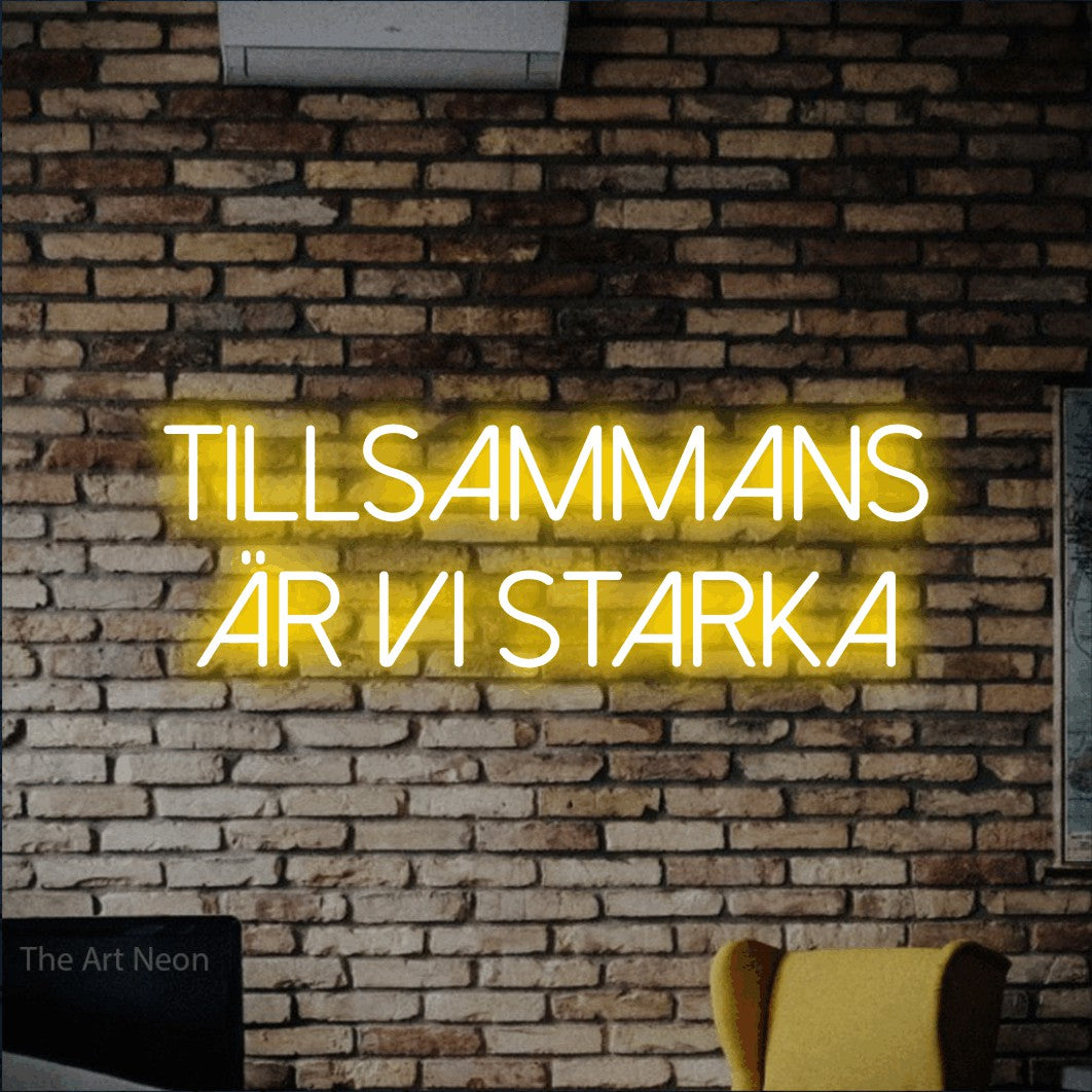 LED neon sign reading “tillsammans är vi starka”, arranged in 2 lines.