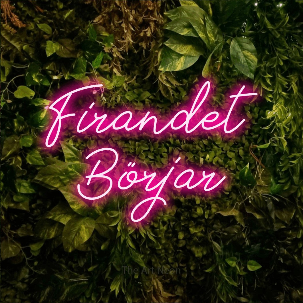 LED neon sign reading “Firandet Börjar”, arranged in 2 lines.