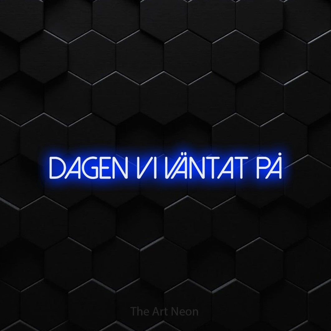 LED neon sign reading “dagen vi väntat på”, arranged in a single line.