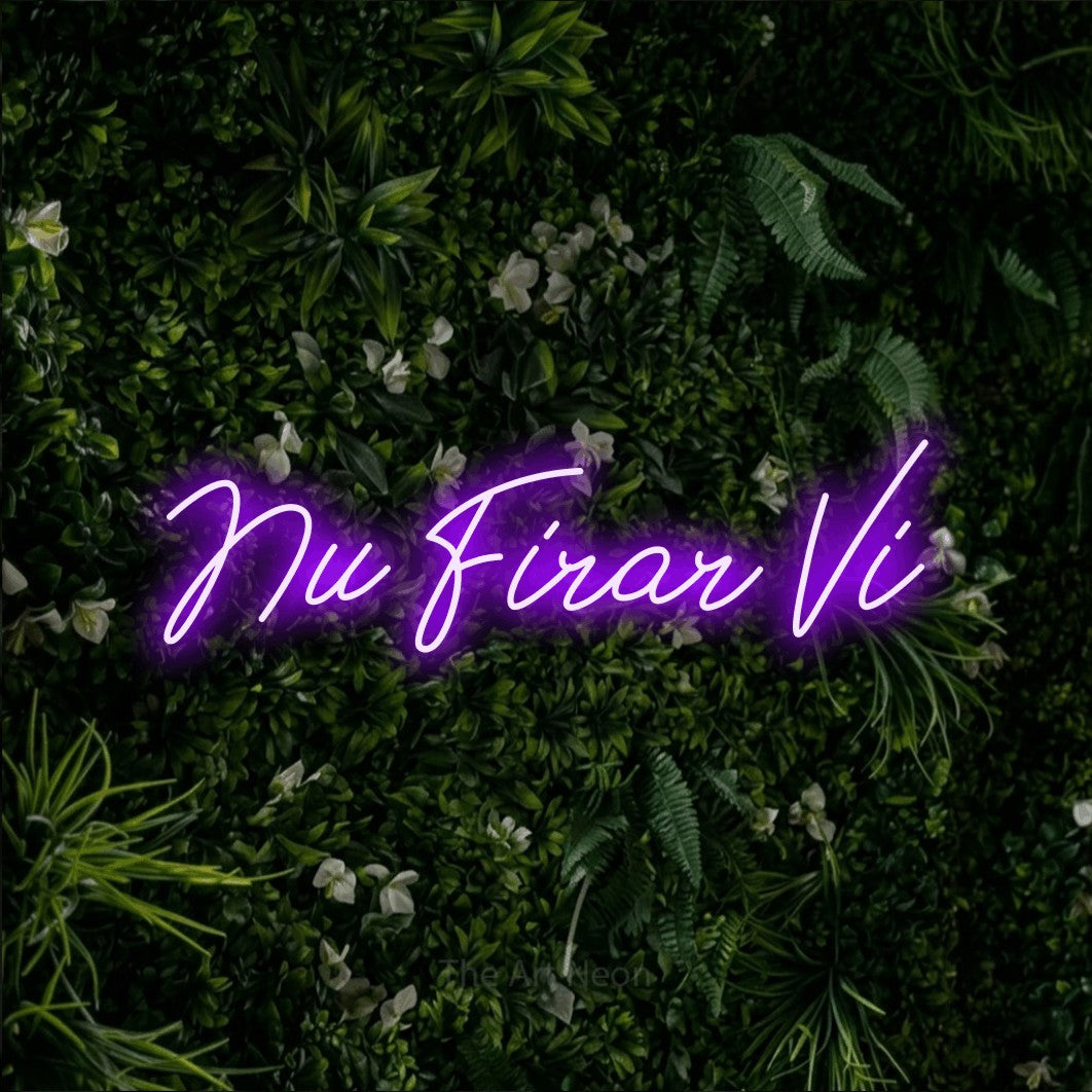LED neon sign reading “Nu Firar Vi”, arranged in a single line.