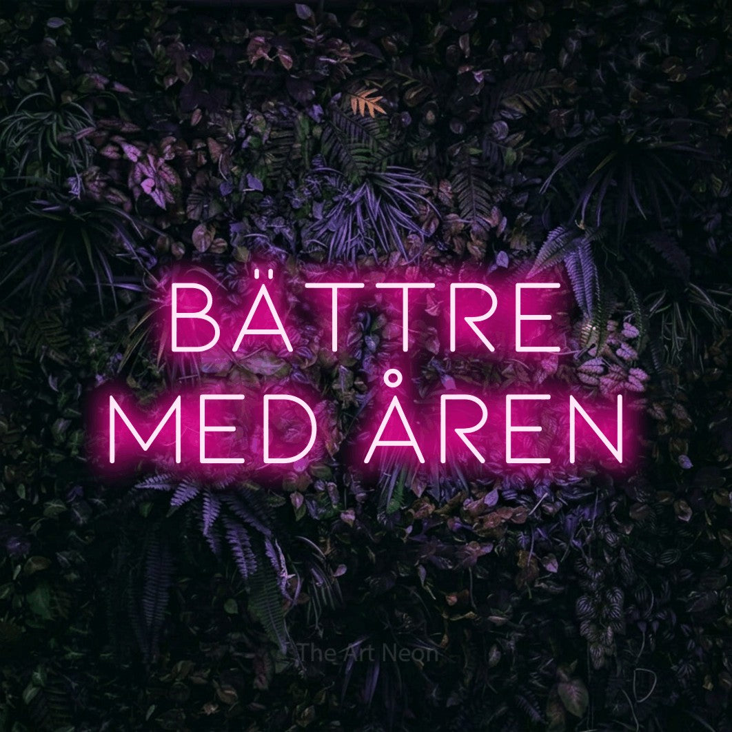 LED neon sign reading “BÄTTRE med åren”, arranged in 2 lines.
