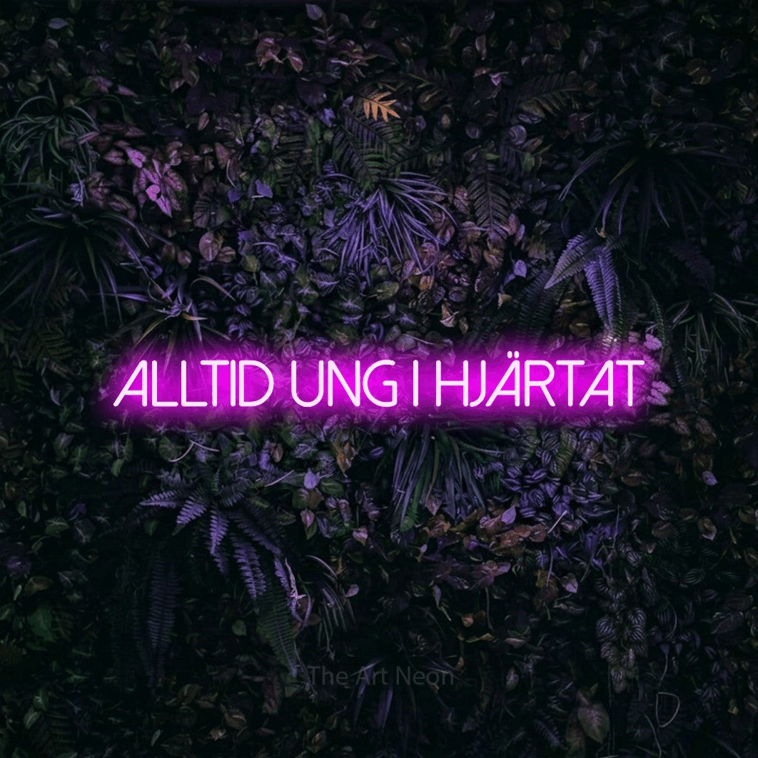 LED neon sign reading “ALLTID UNG I HJÄRTAT”, arranged in a single line.