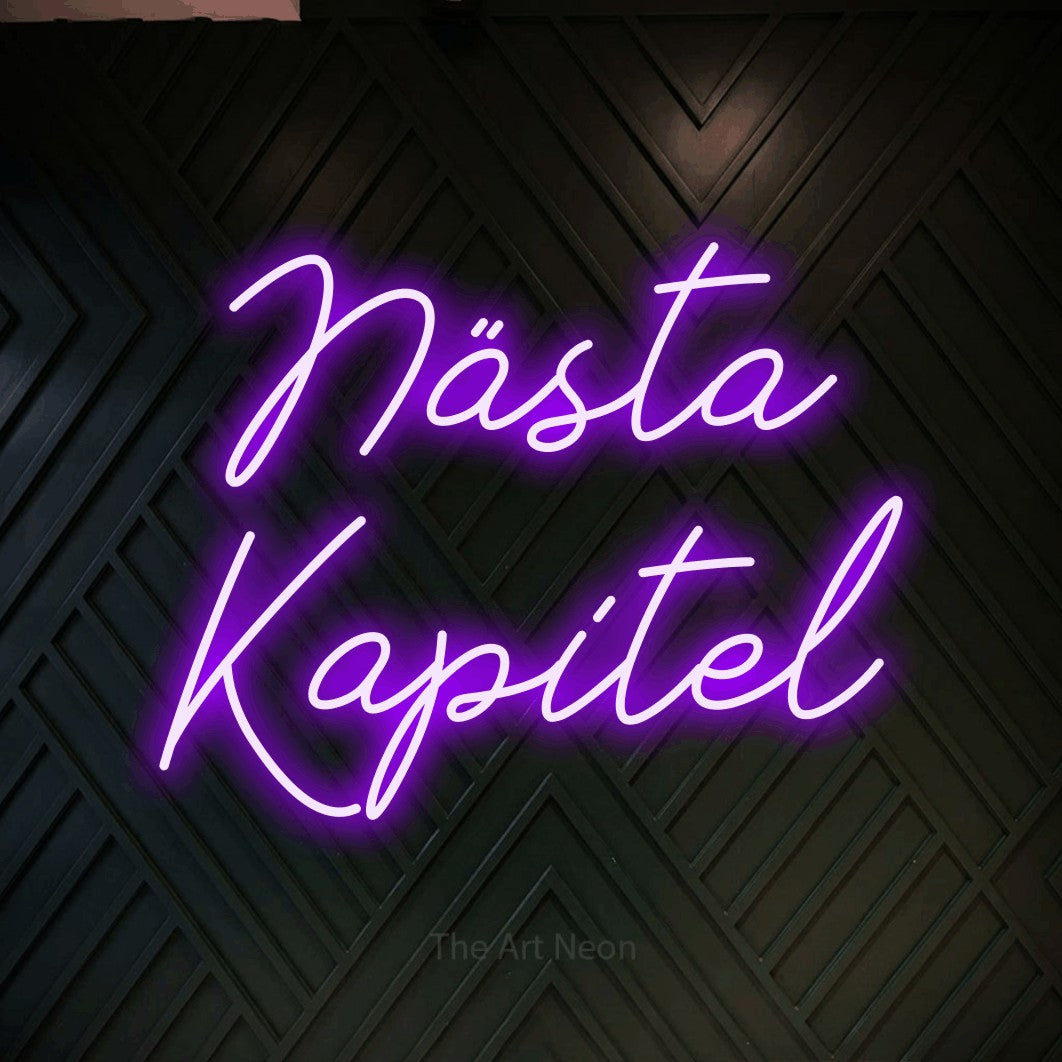 LED neon sign reading “Nästa Kapitel”, arranged in 2 lines.
