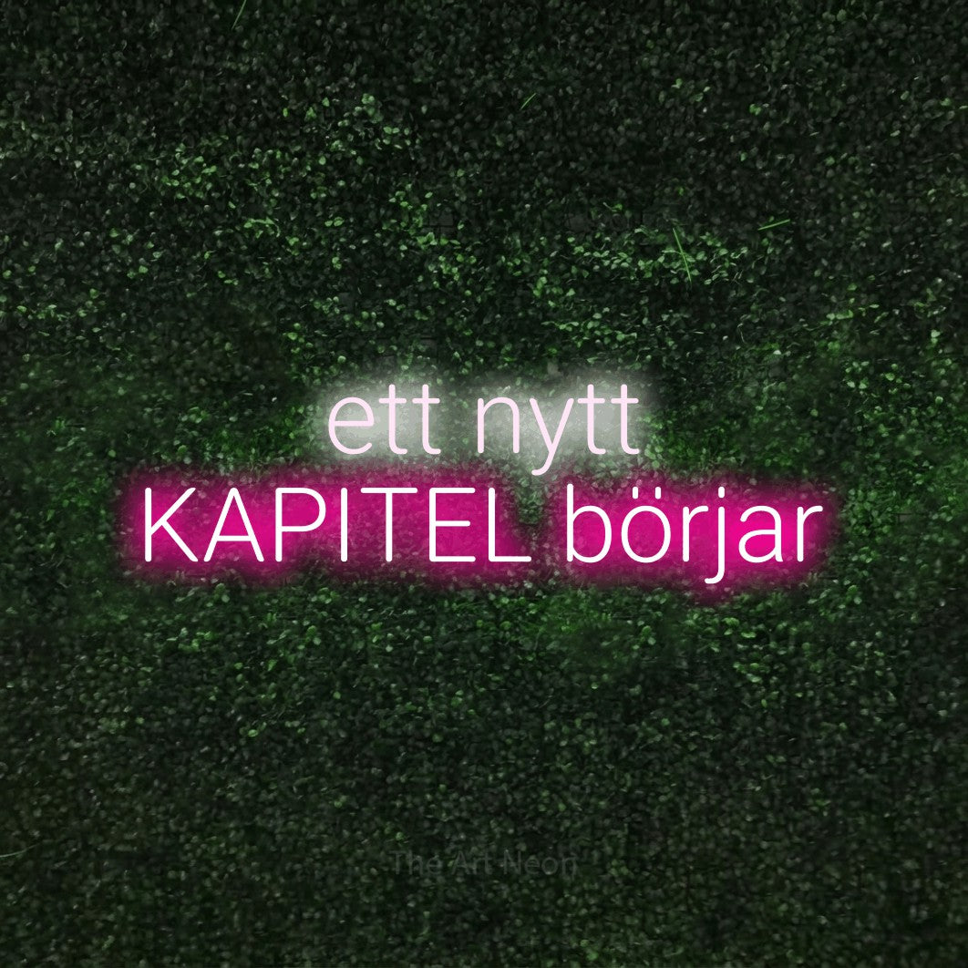 LED neon sign reading “ett nytt KAPITEL börjar”, arranged in 2 lines.