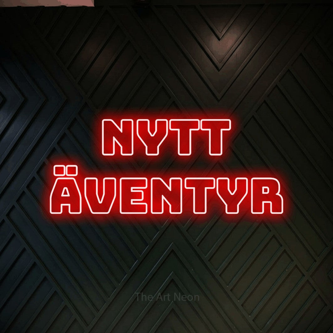 LED neon sign reading “Nytt Äventyr”, arranged in 2 lines.