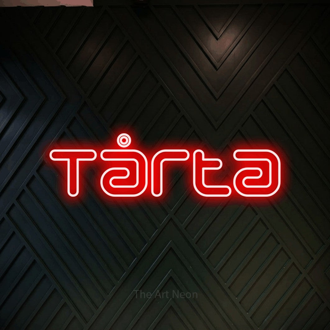 LED neon sign reading “Tårta”, arranged in a single line.