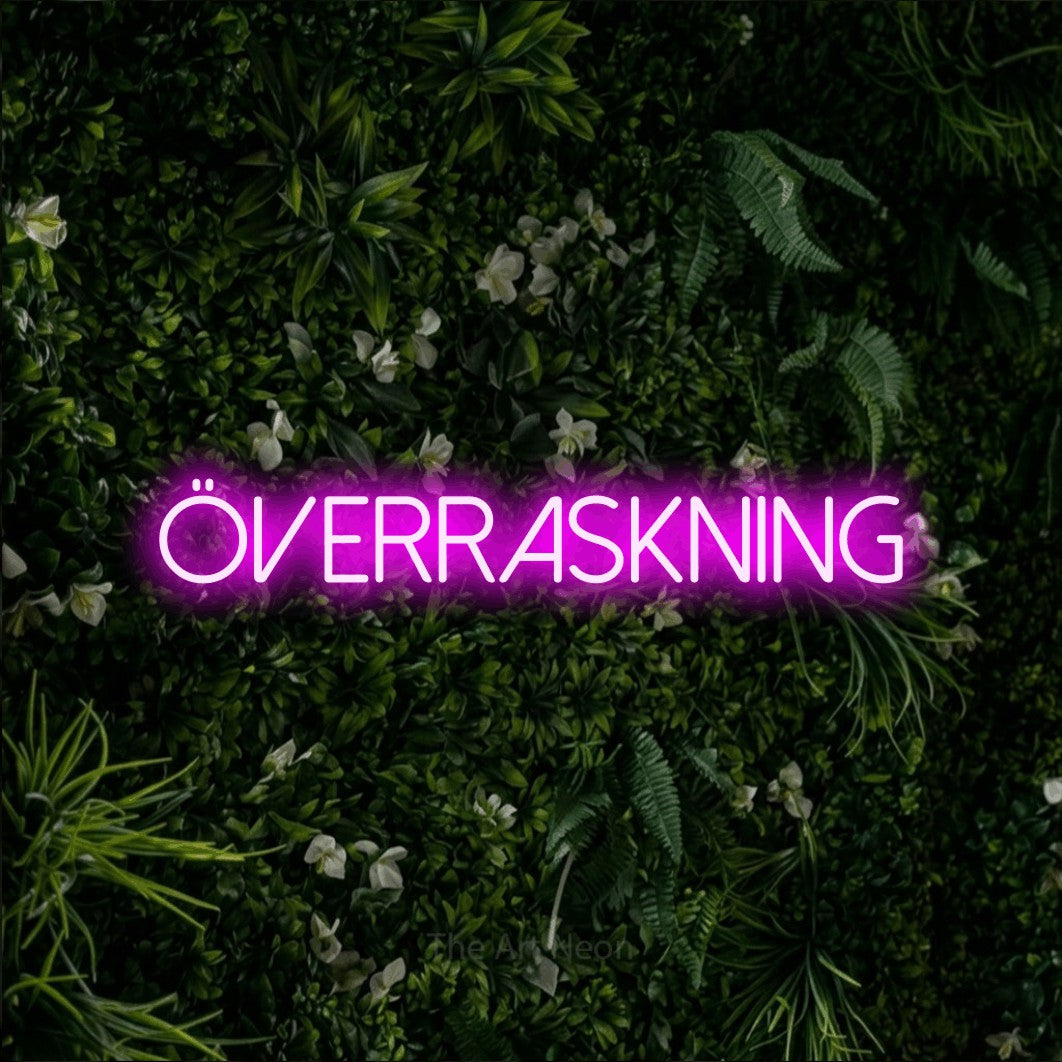 LED neon sign reading “Överraskning”, arranged in a single line.