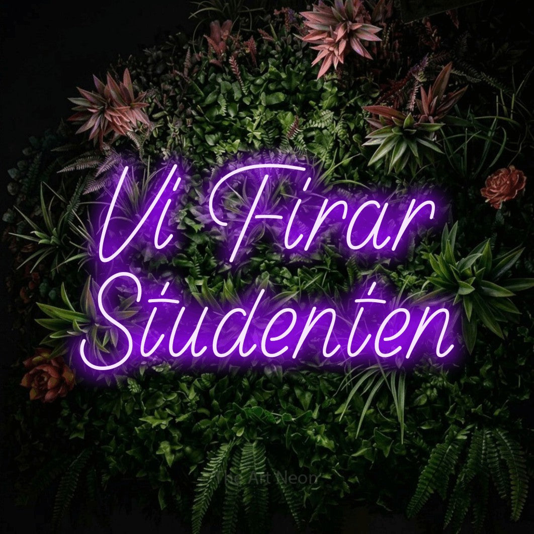 LED neon sign reading “Vi Firar Studenten”, arranged in 2 lines.