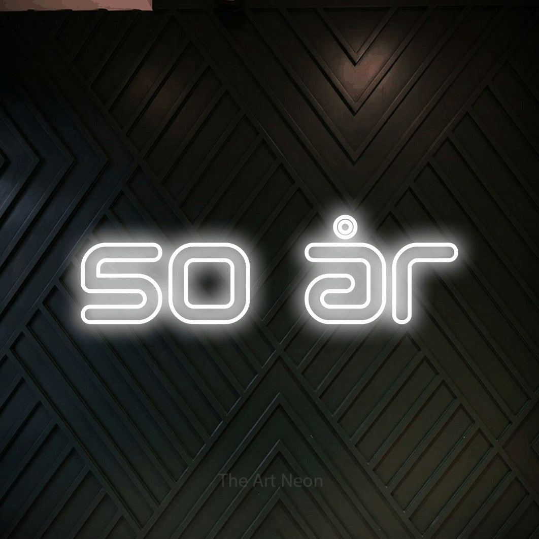 LED neon sign reading “50 år”, arranged in a single line.