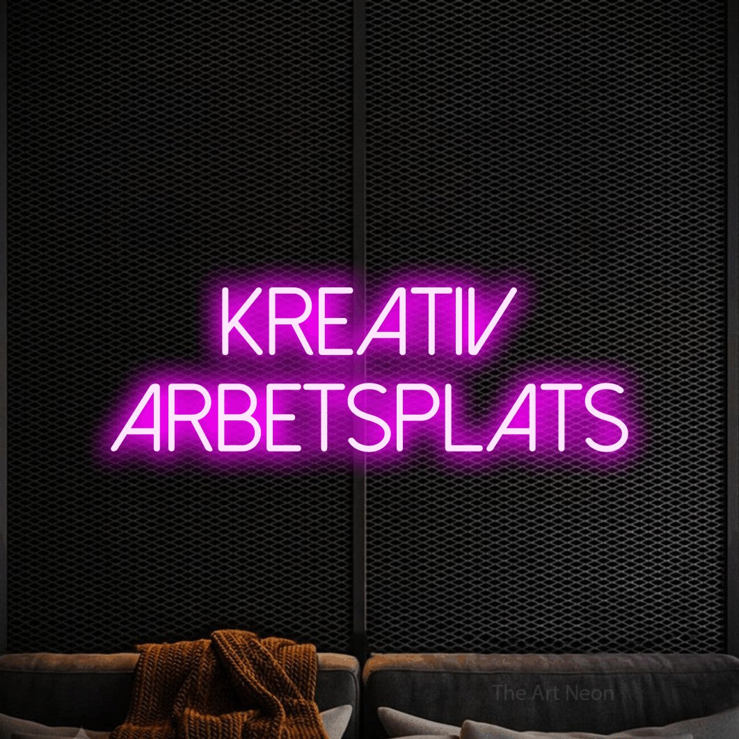 LED neon sign reading “kreativ arbetsplats”, arranged in 2 lines.