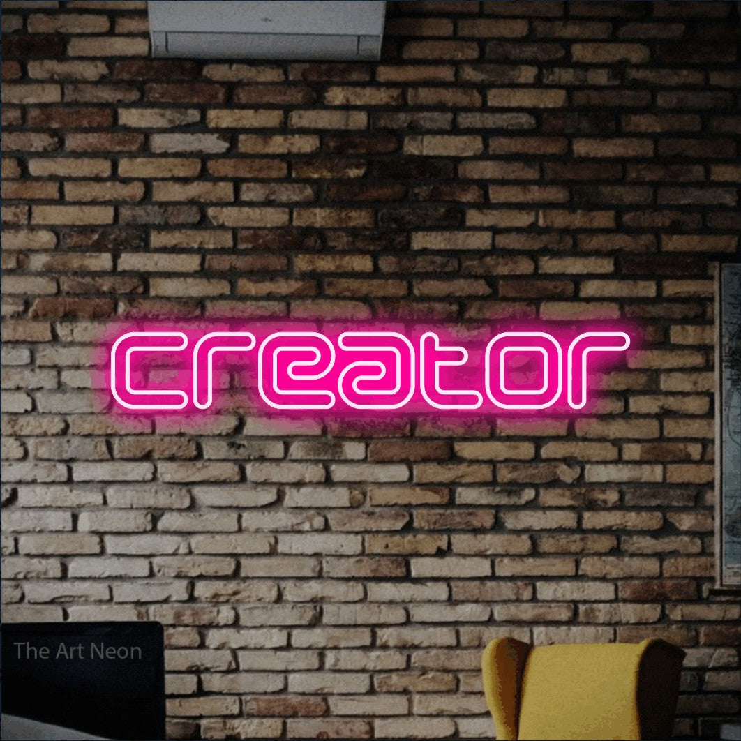 LED neon sign reading “Creator”, arranged in a single line.