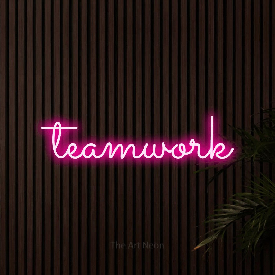 LED neon sign reading “teamwork”, arranged in a single line.