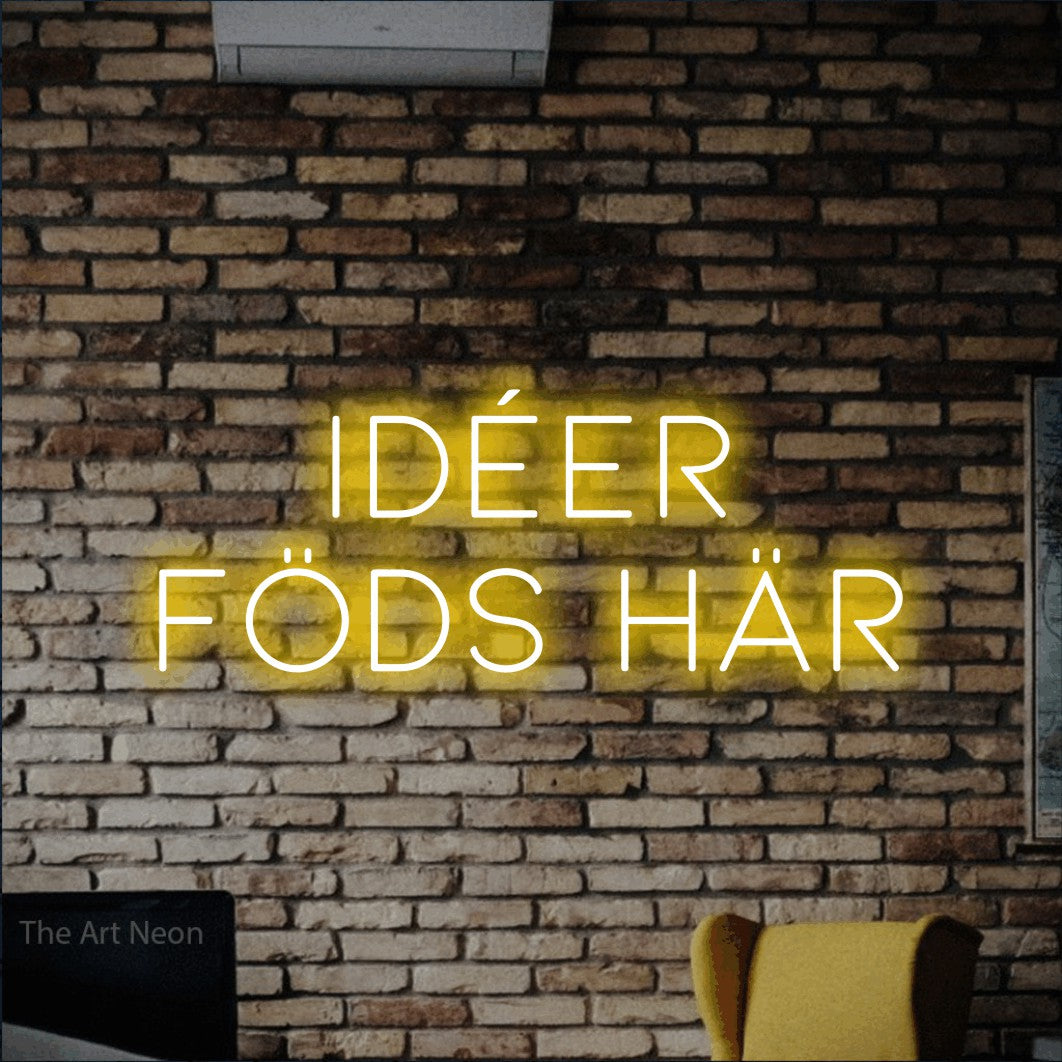 LED neon sign reading “idéer föds här”, arranged in 2 lines.