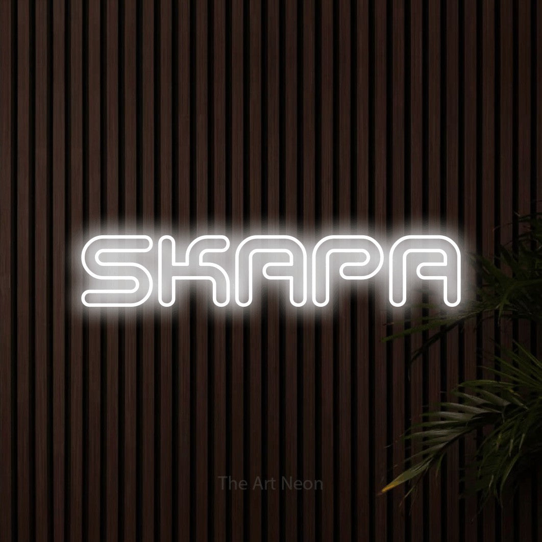 LED neon sign reading “SKAPA”, arranged in a single line.