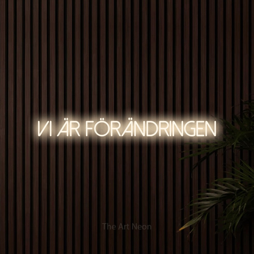 LED neon sign reading “Vi Är Förändringen”, arranged in a single line.