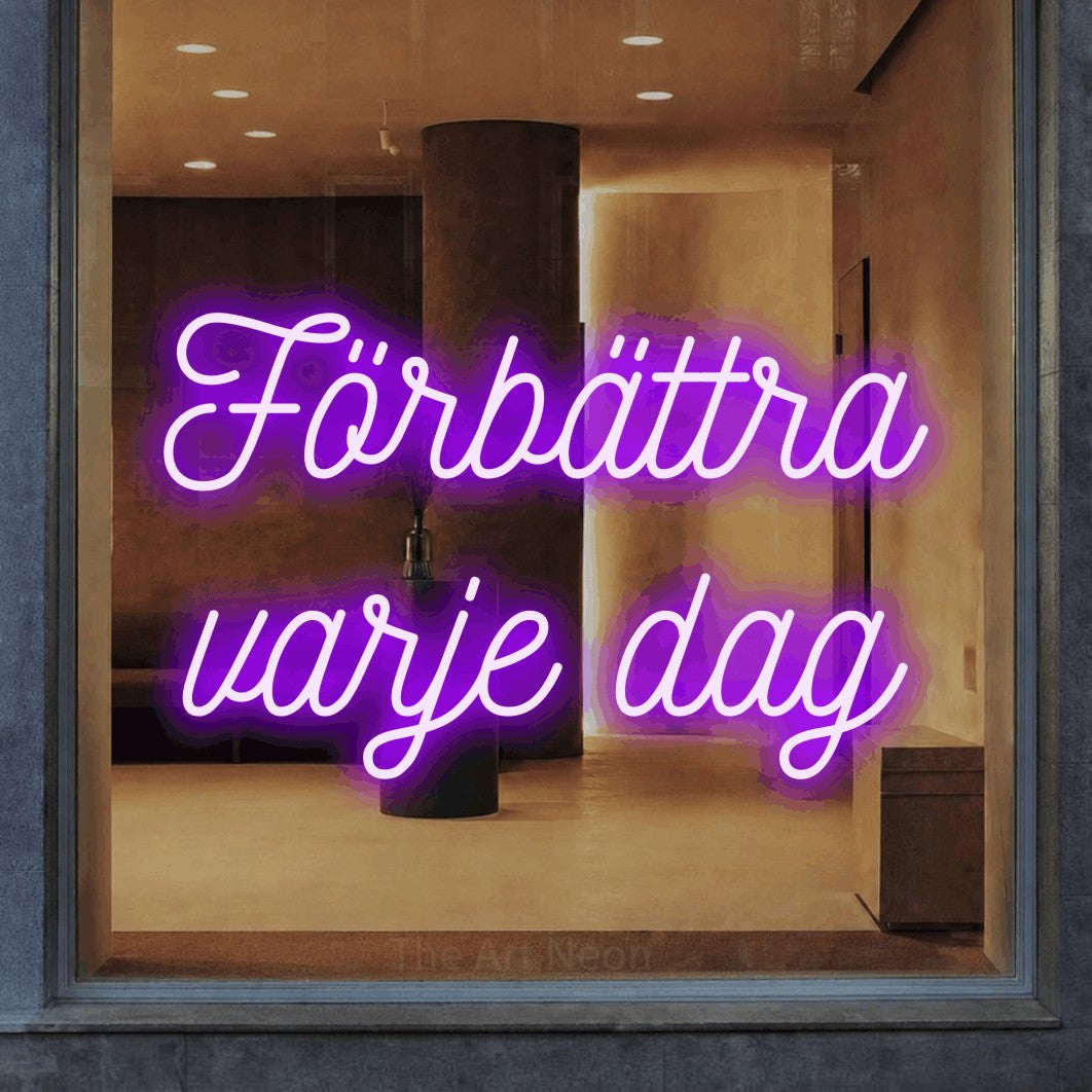 LED neon sign reading “Förbättra varje dag”, arranged in 2 lines.
