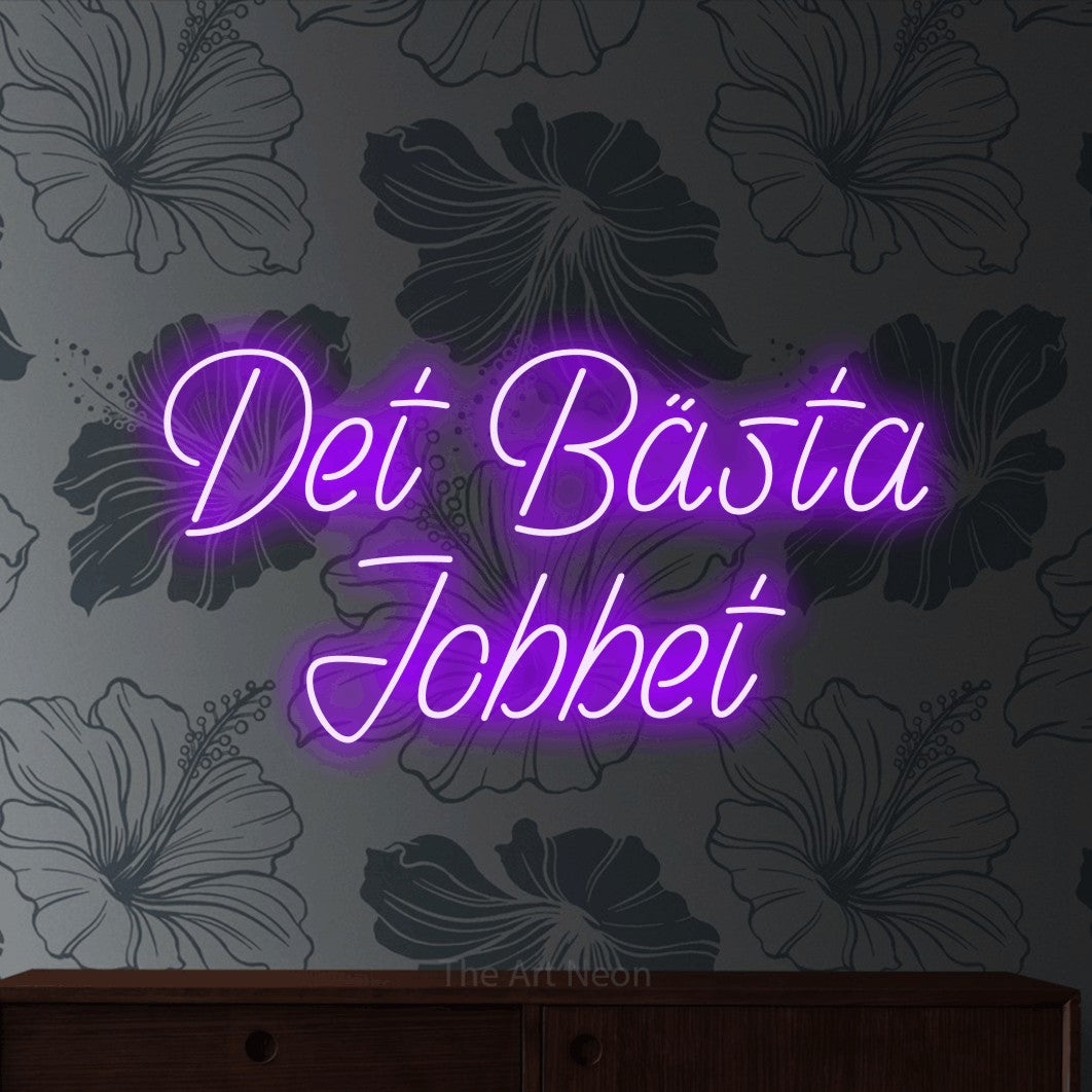 LED neon sign reading “Det Bästa Jobbet”, arranged in 2 lines.