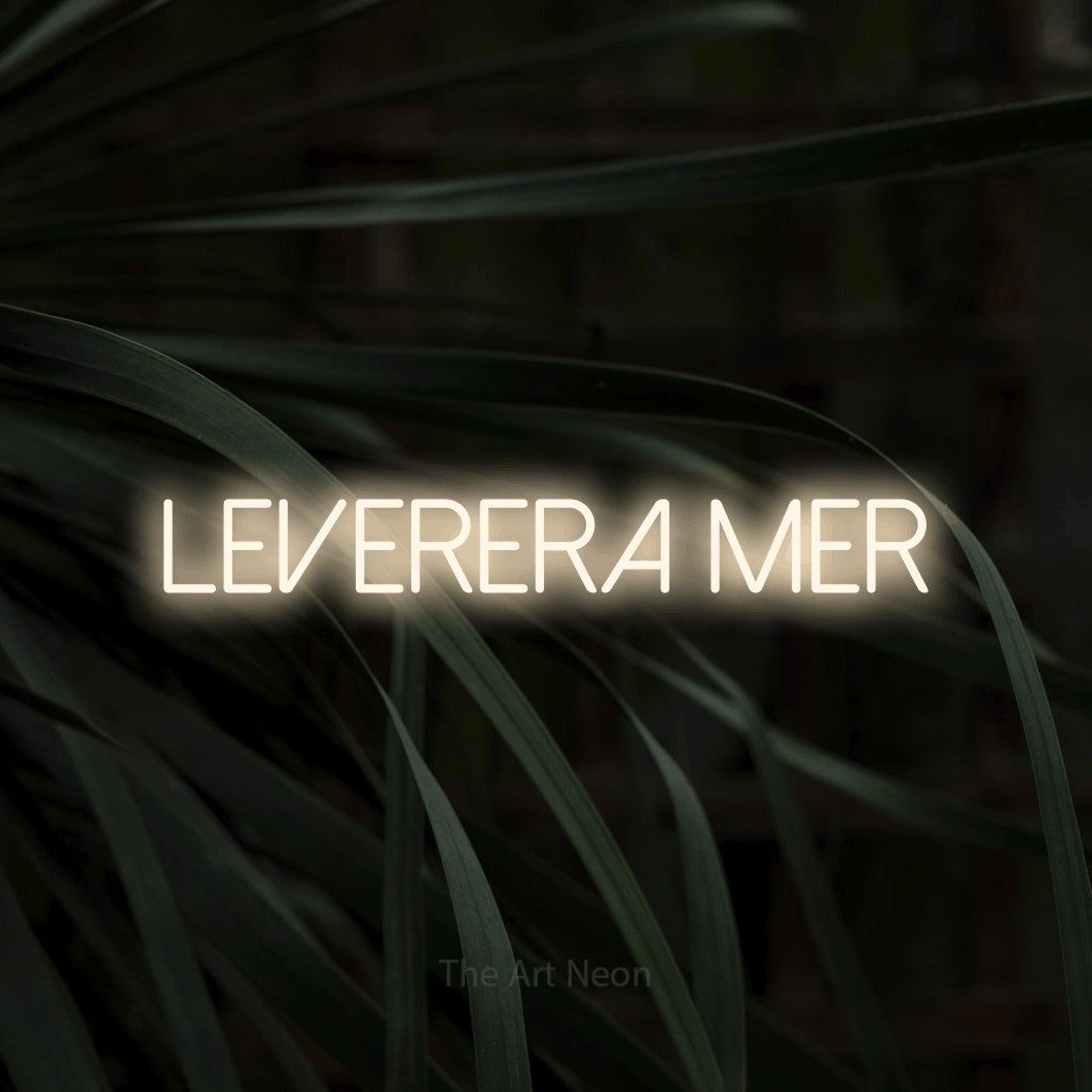 LED neon sign reading “Leverera Mer”, arranged in a single line.