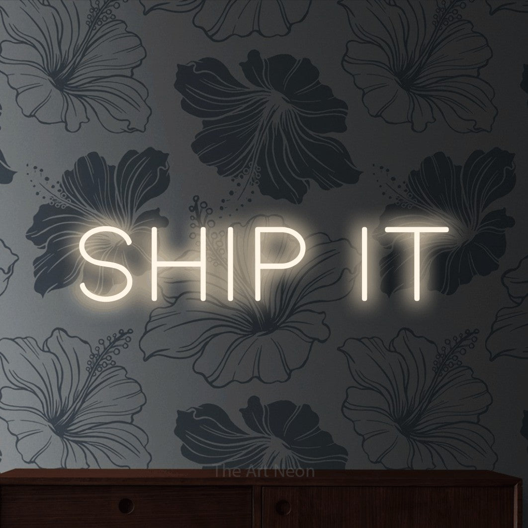 LED neon sign reading “Ship It”, arranged in a single line.