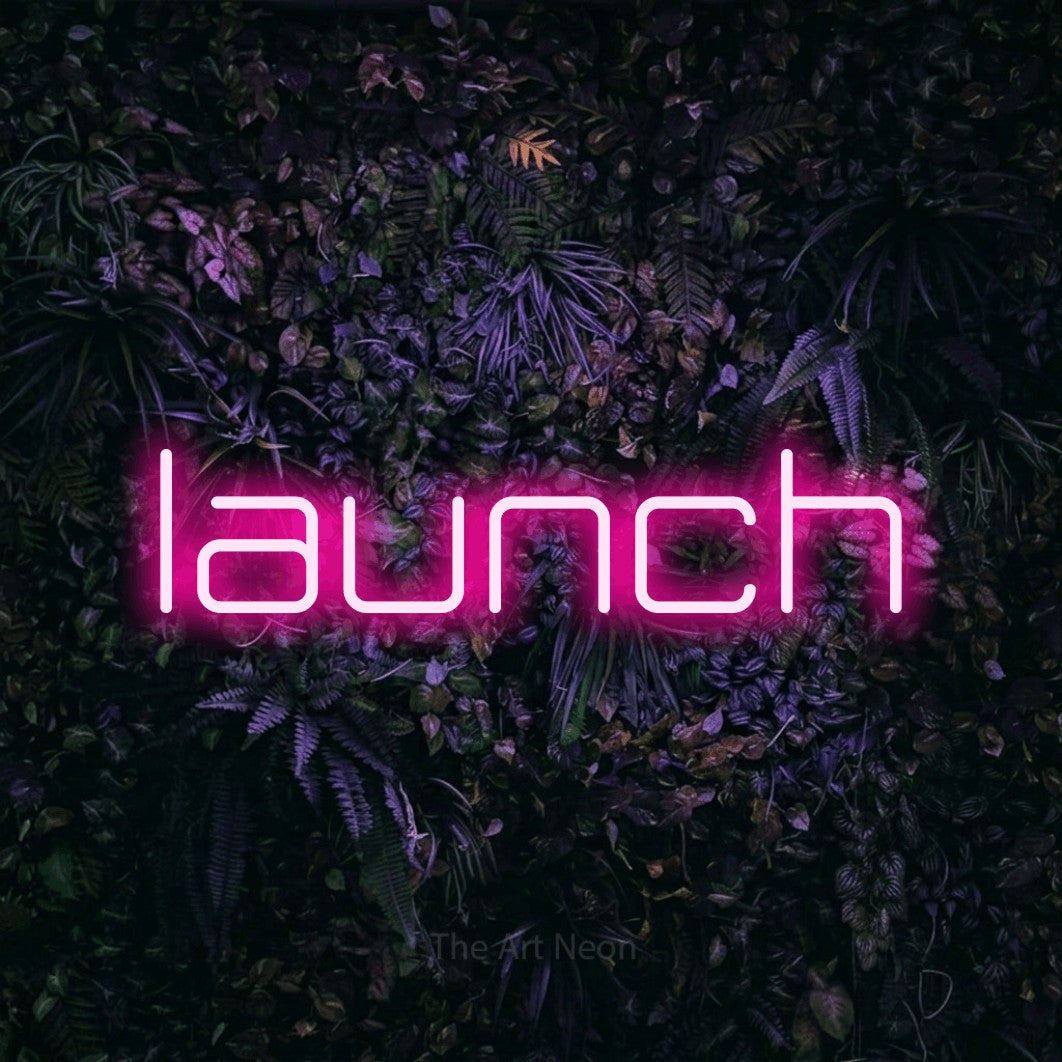 LED neon sign reading “launch”, arranged in a single line.