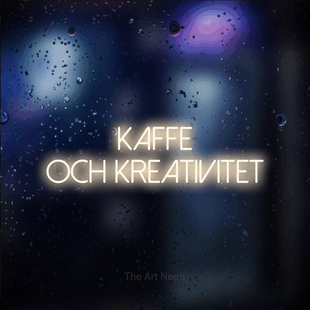 LED neon sign reading “kaffe och KREATIVITET”, arranged in 2 lines.