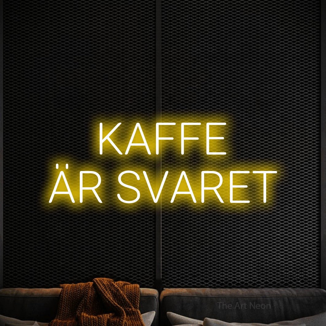 LED neon sign reading “KAFFE ÄR SVARET”, arranged in 2 lines.