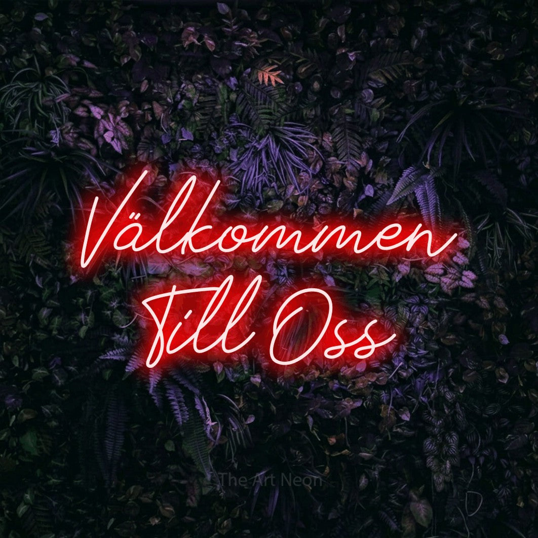LED neon sign reading “Välkommen Till Oss”, arranged in 2 lines.