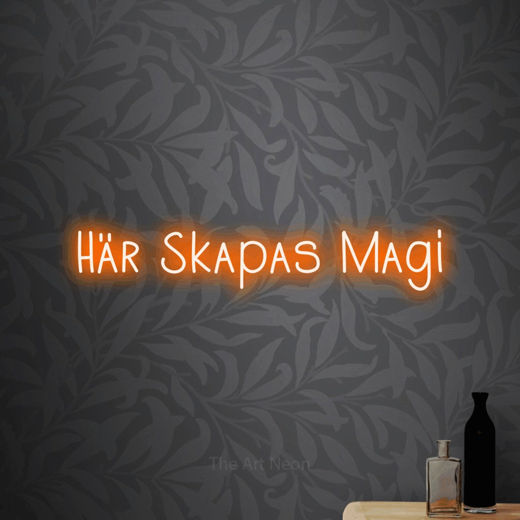 LED neon sign reading “Här Skapas Magi”, arranged in a single line.