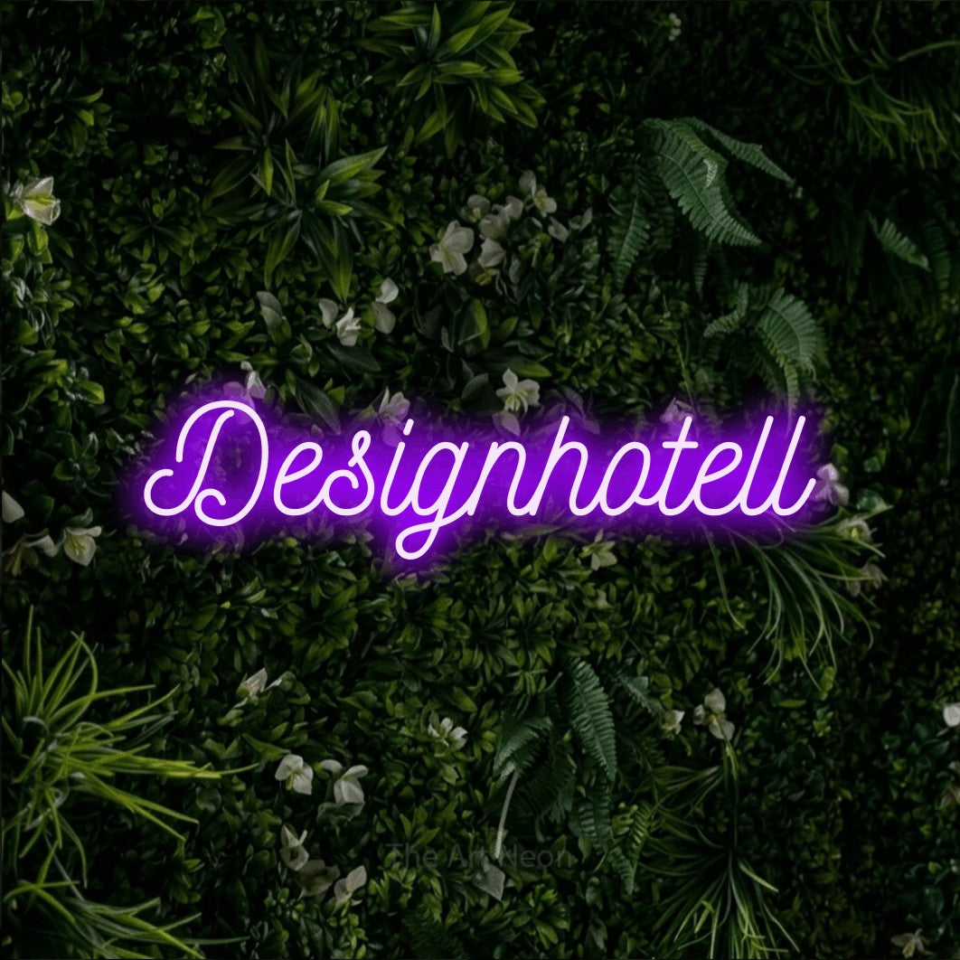 LED neon sign reading “Designhotell”, arranged in a single line.