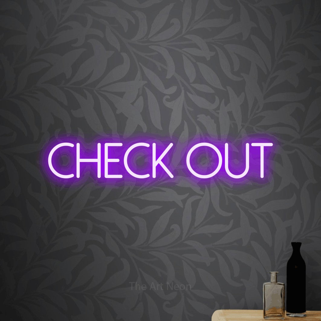 LED neon sign reading “Check out”, arranged in a single line.