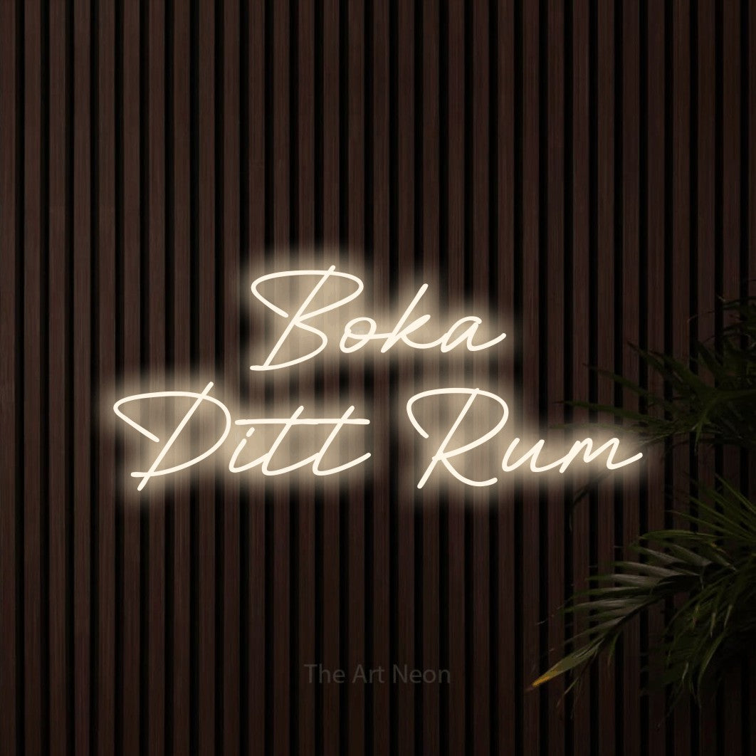 LED neon sign reading “Boka Ditt Rum”, arranged in 2 lines.