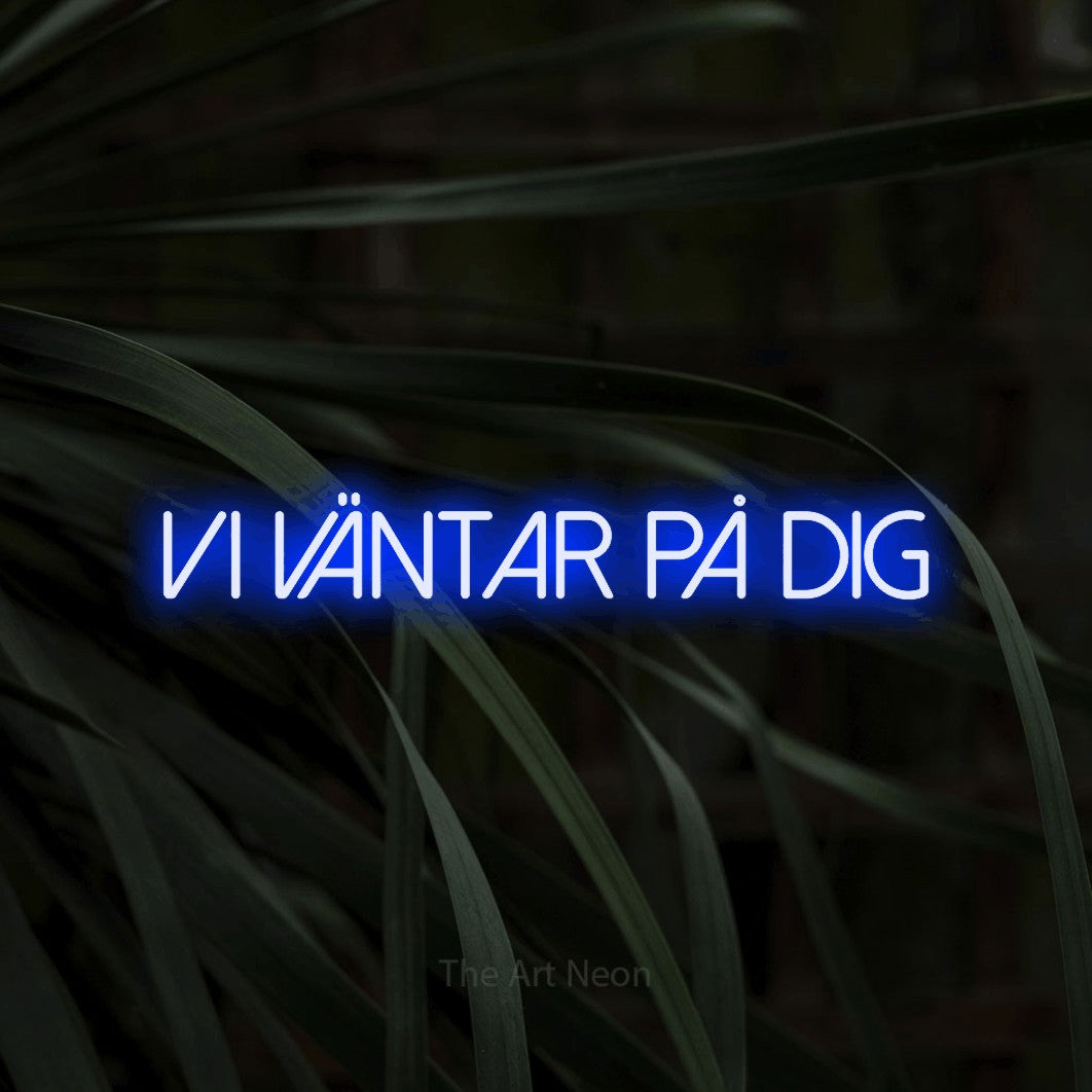 LED neon sign reading “vi väntar på dig”, arranged in a single line.